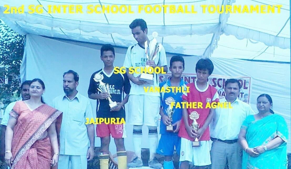 Ayush Rawat and teammates receiving second place at an inter school football tournament